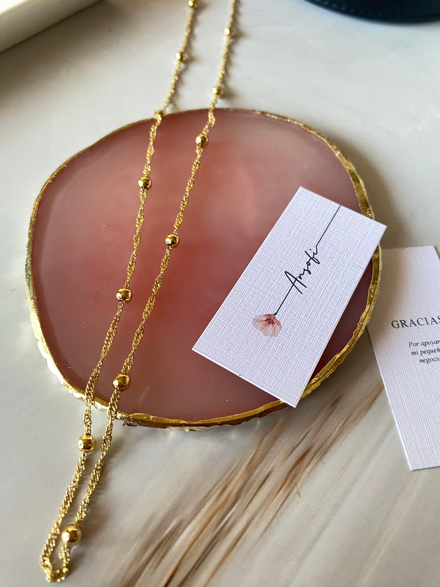 Cadena esferas doradas