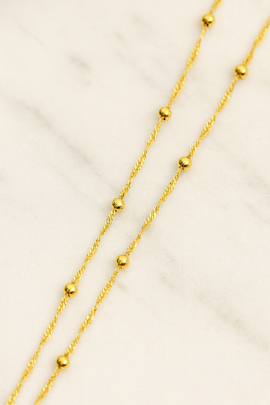 Cadena esferas doradas